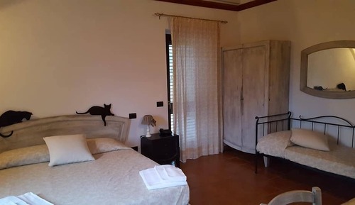 Habitación triple Deluxe, terraza, vistas al jardín (10)