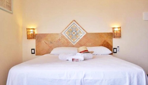 Habitación superior, varias camas