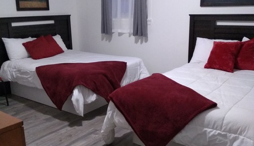 Habitación cuádruple Deluxe, 2 camas dobles