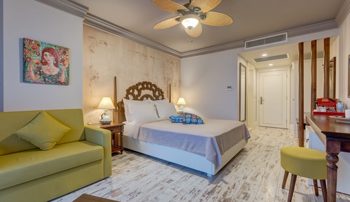 Habitación triple, vistas al mar