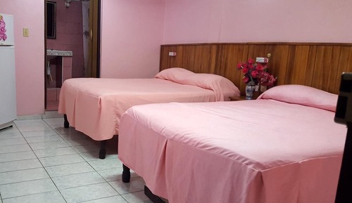 Habitación cuádruple familiar, 2 camas de matrimonio, no fumadores, vistas al mar