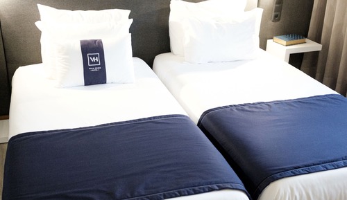 Habitación estándar con 2 camas individuales, varias camas