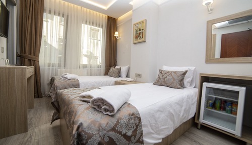 Habitación estándar con 1 cama doble o 2 individuales