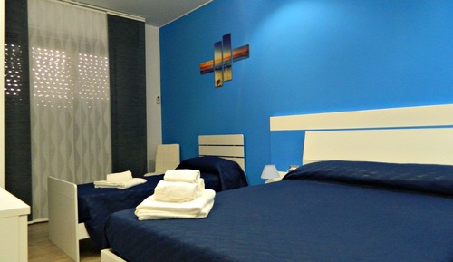 Habitación triple Deluxe (102)
