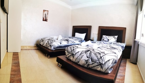 Habitación con 2 camas individuales