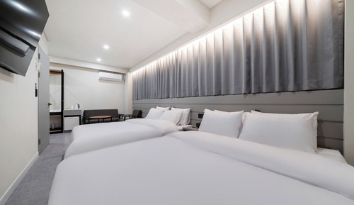 Habitación familiar, 2 camas de matrimonio, no fumadores, vistas a la ciudad