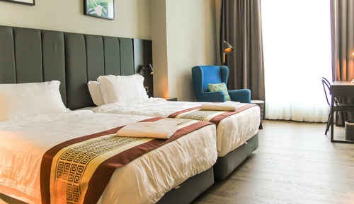 Habitación Deluxe con 2 camas individuales, varias camas