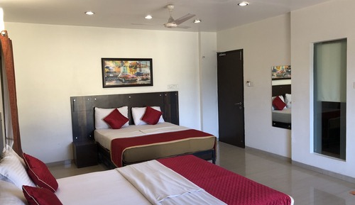 Habitación cuádruple Deluxe, 2 camas dobles, vistas a la ciudad