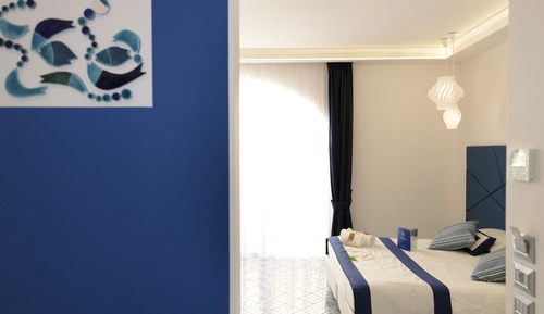 Habitación doble superior, 1 cama de matrimonio con sofá cama, vistas al mar