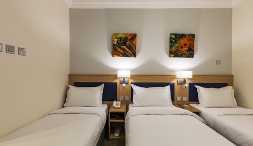 Triple Room, 3 Twin Beds, City View