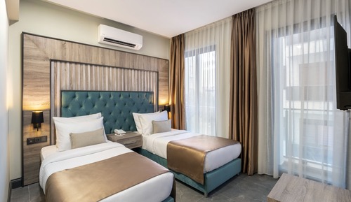 Habitación estándar con 1 cama doble o 2 individuales