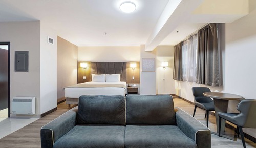 Suite, 1 cama de matrimonio grande, no fumadores, cocina (with Sofabed, Full Kitchen)
