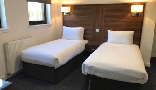 Habitación con 2 camas individuales