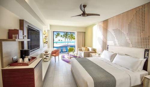 Suite junior, 1 cama de matrimonio grande con sofá cama, frente al mar (Club, Swim Up)