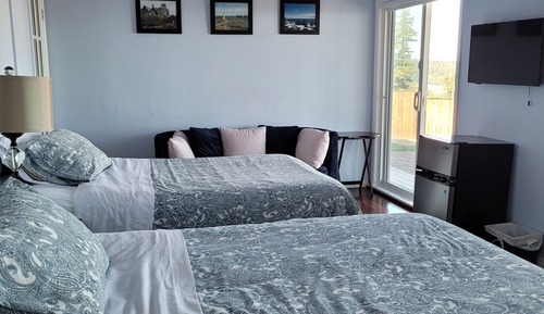 Habitación familiar doble, 2 camas dobles, no fumadores, vistas al mar