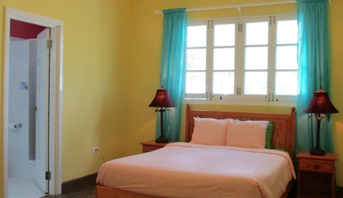 Habitación Premium, 2 camas de matrimonio, baño privado, vistas parciales al mar