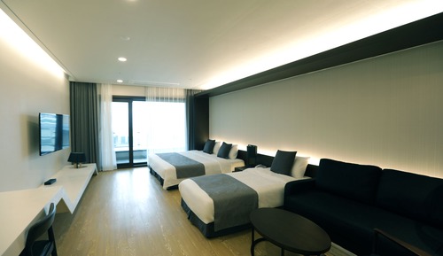 Habitación familiar con 2 camas individuales