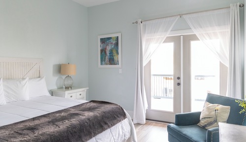 Suite superior, varias camas, no fumadores, vistas parciales al mar