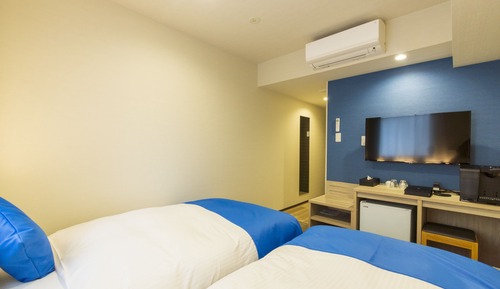 Habitación estándar con 2 camas individuales, varias camas