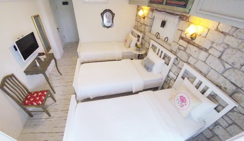 Habitación triple estándar, vistas al jardín