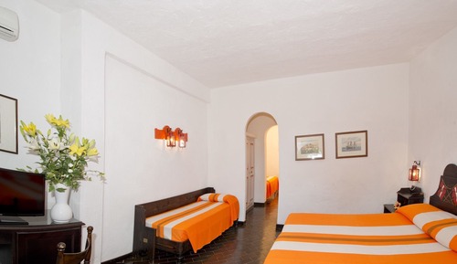 Habitación cuádruple estándar, varias camas
