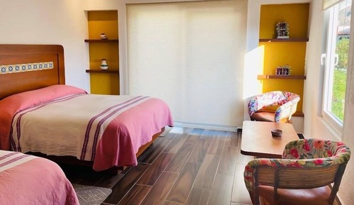Habitación cuádruple, 2 camas de matrimonio, terraza, vistas a la montaña