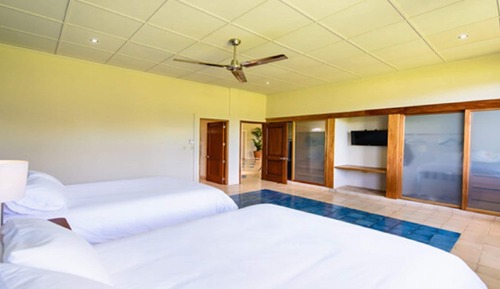 Habitación doble, 2 camas de matrimonio, vistas al jardín
