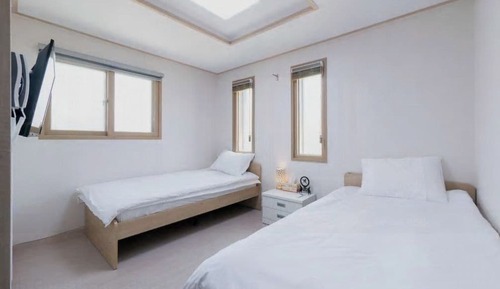 Habitación con 2 camas individuales