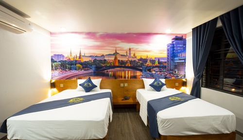Habitación básica con 1 cama doble o 2 individuales, vistas a la ciudad