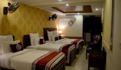 Habitación triple familiar, varias camas