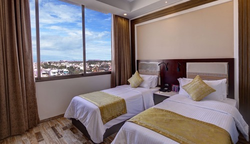 Habitación Deluxe con 1 cama doble o 2 individuales