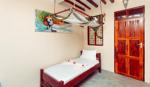 Habitación triple Confort, no fumadores, vistas al jardín
