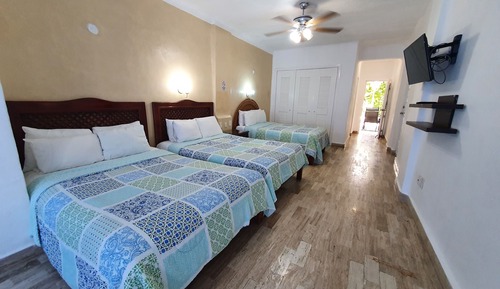 Suite estudio familiar, varias camas, no fumadores, vistas al mar