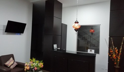 Habitación cuádruple, varias camas