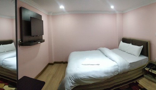 Habitación estándar con 1 cama doble o 2 individuales
