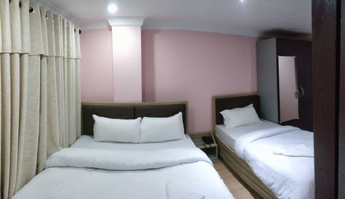 Habitación triple Deluxe