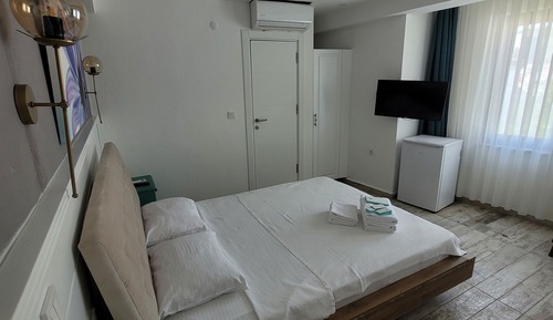 Habitación triple Deluxe, vistas a la ciudad