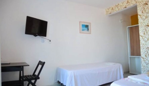 Habitación cuádruple básica, 2 habitaciones, vistas al mar, frente a la playa