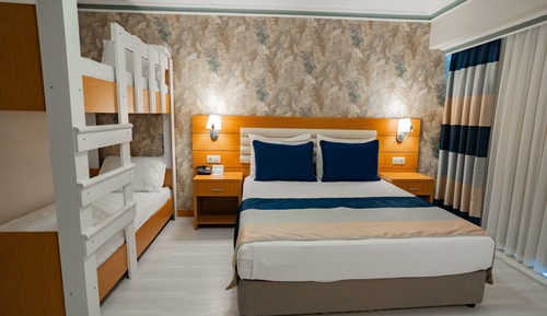 Dormitorio compartido familiar, vistas al jardín