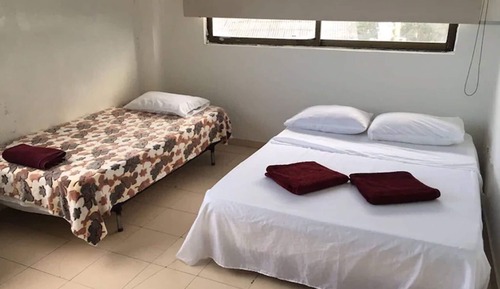 Habitación cuádruple, varias camas
