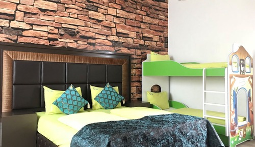 Habitación cuádruple Deluxe