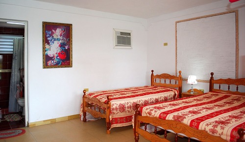 Habitación junior con 1 cama doble o 2 individuales