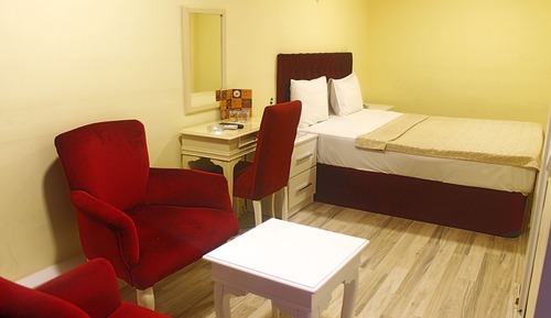 Habitación estándar con 1 cama doble o 2 individuales