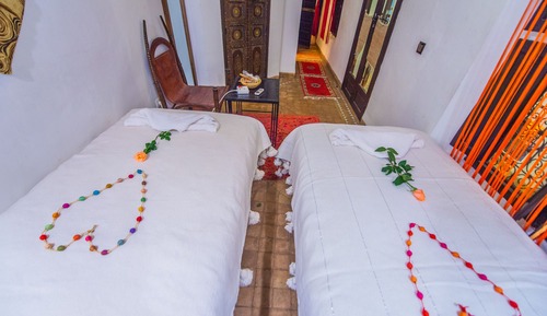 Habitación romántica con 2 camas individuales