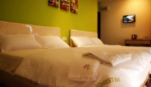 Habitación cuádruple Deluxe, 2 camas dobles (Deluxe Twin Double)