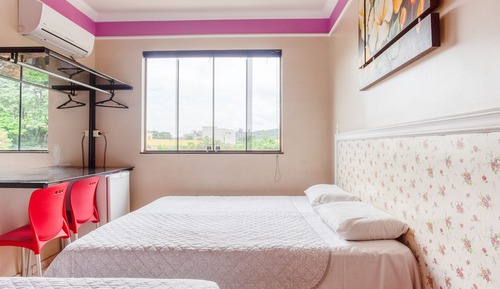 Habitación cuádruple, varias camas