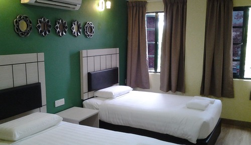 Habitación con 2 camas individuales