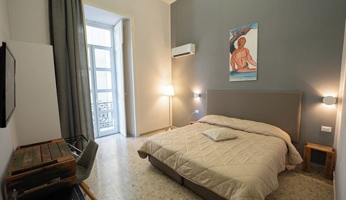 Habitación triple Deluxe, en edificio anexo (Pzza Bovio)