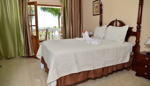 Habitación Deluxe con 2 camas individuales, 2 camas de matrimonio, vistas al jardín