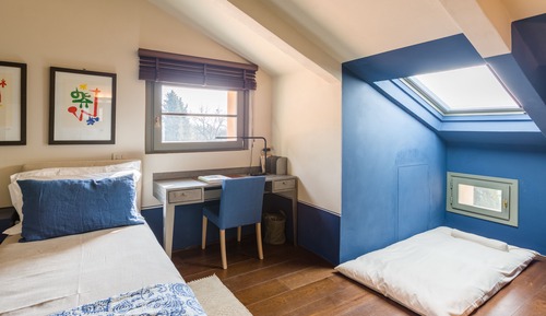 Habitación Deluxe con 1 cama doble o 2 individuales, en una planta alta